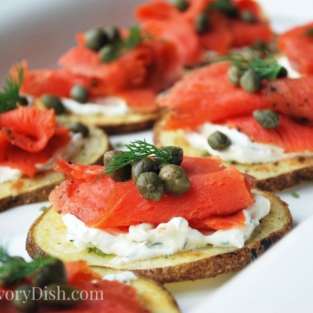 Smoked salmon potato rounds with creamy yogurt, chives, and capers are a healthy game day appetizer or an elegant party snack.