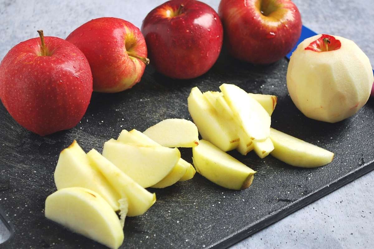 sliced apples on a cutting board