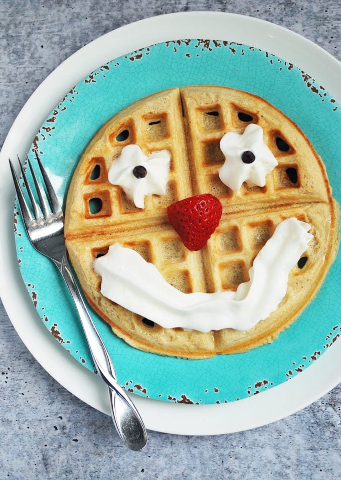 This simple tasty waffle recipe from scratch made with unbleached flour, eggs, milk and butter is a must try and your kids will love decorating them!