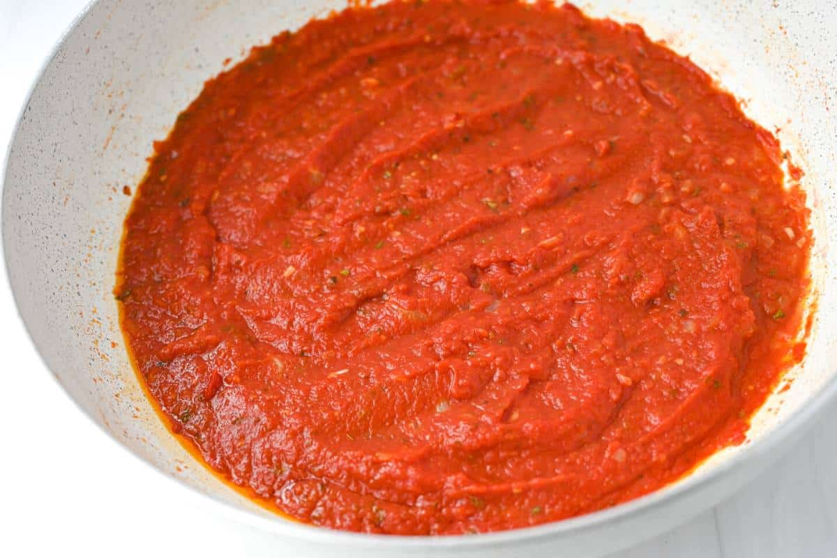 pizza sauce cooked in a skillet ready to use