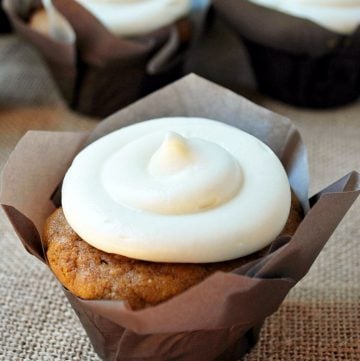 pumpkin cupcake with a swirl of maple frosting on top
