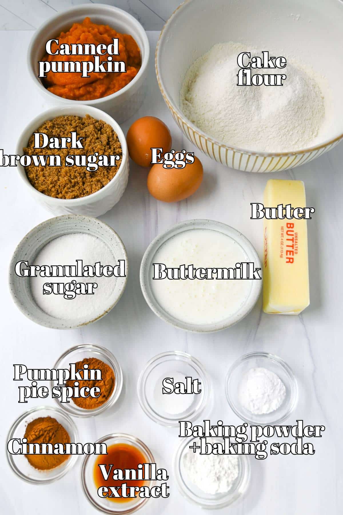 ingredients for pumpkin cupcakes measured out on a counter