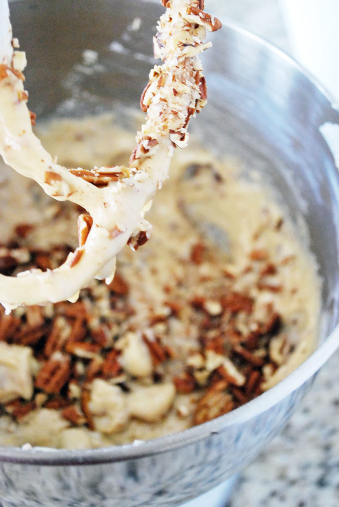 adding nuts to date nut bread batter