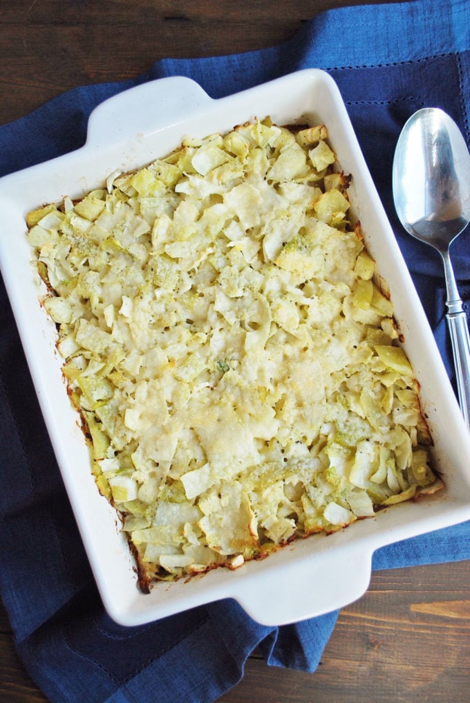 Cabbage Casserole baked with a spoon and blue napkin