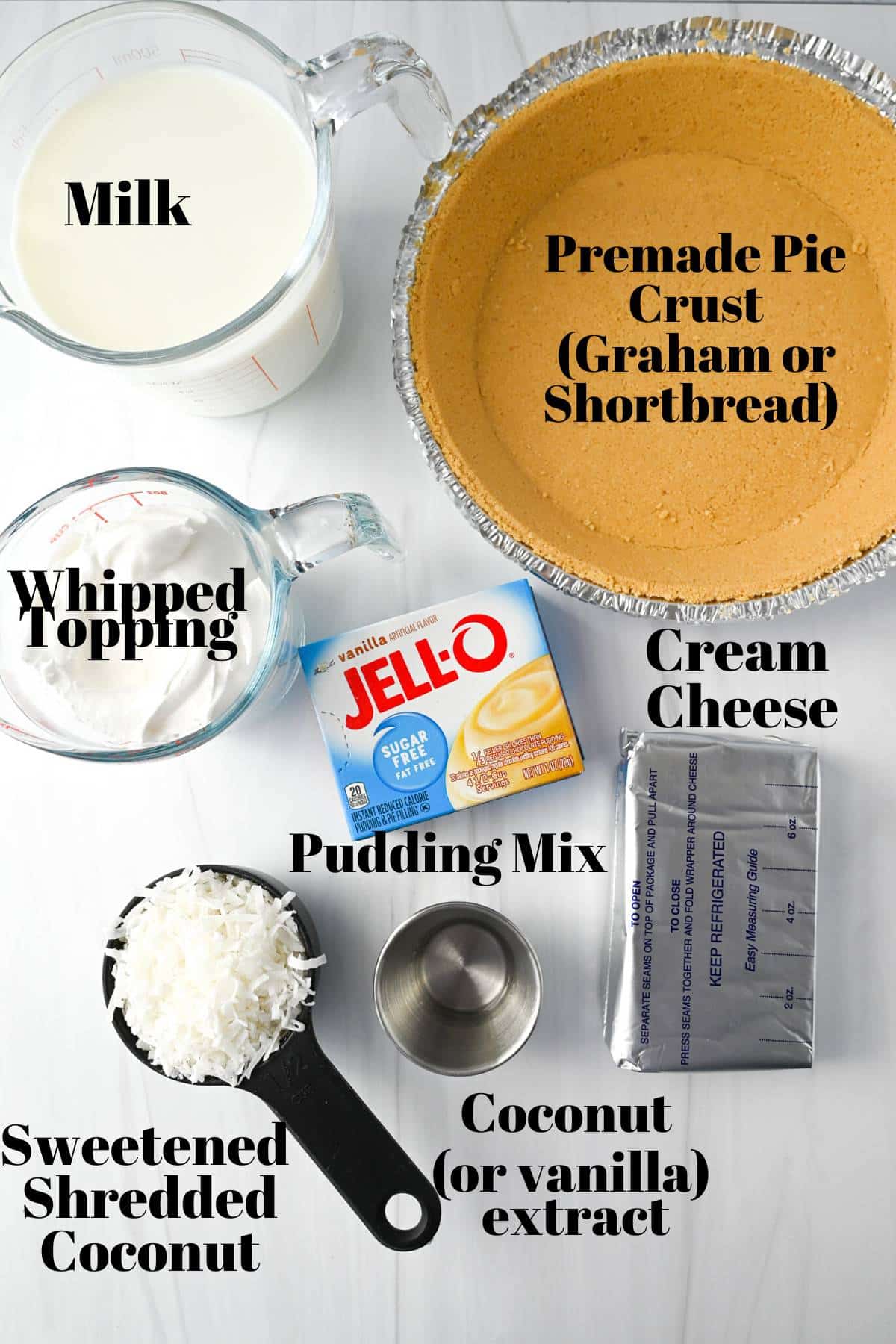 ingredients for no bake coconut cream pie on a counter measured out in dishes