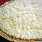 close up of a coconut pie in a disposable pie pan