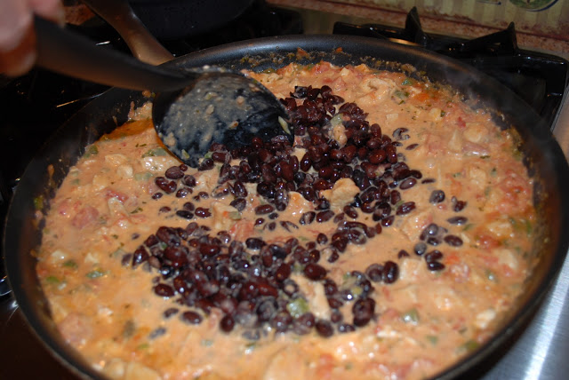 stirring in beans stirring in beans