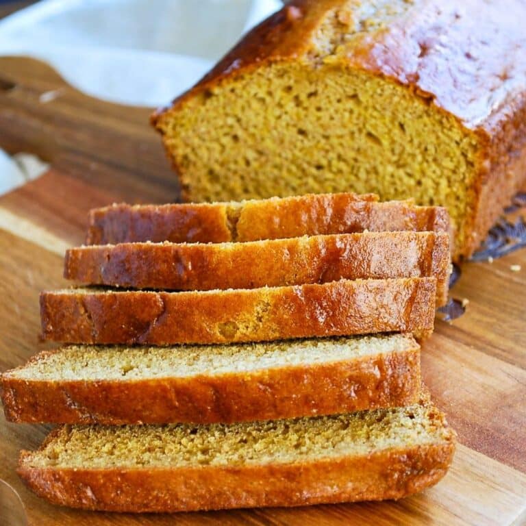 sliced loaf of graham bread on a cutting board