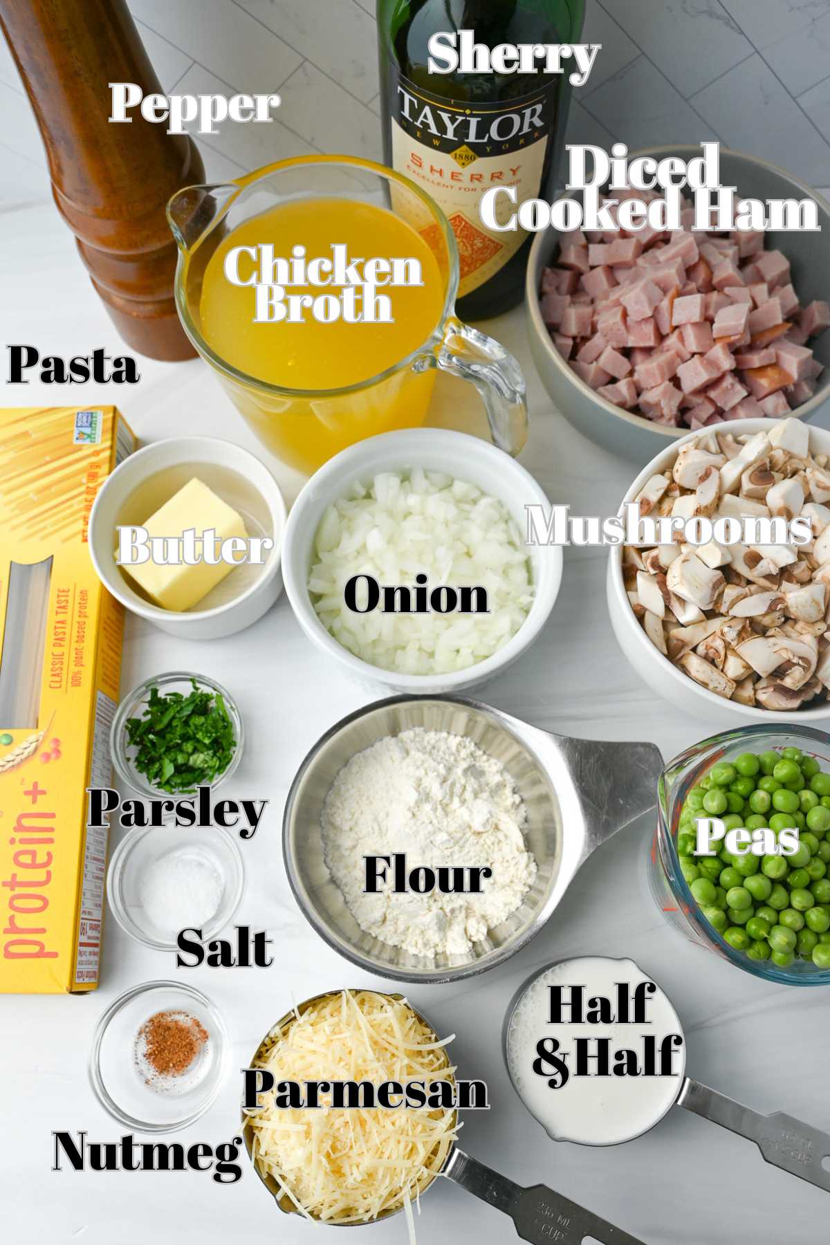 ingredients for ham pasta casserole measured out on a counter