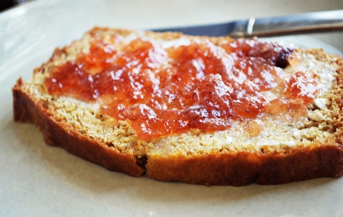 Delicious soft graham bread sliced and toasted with butter and jam