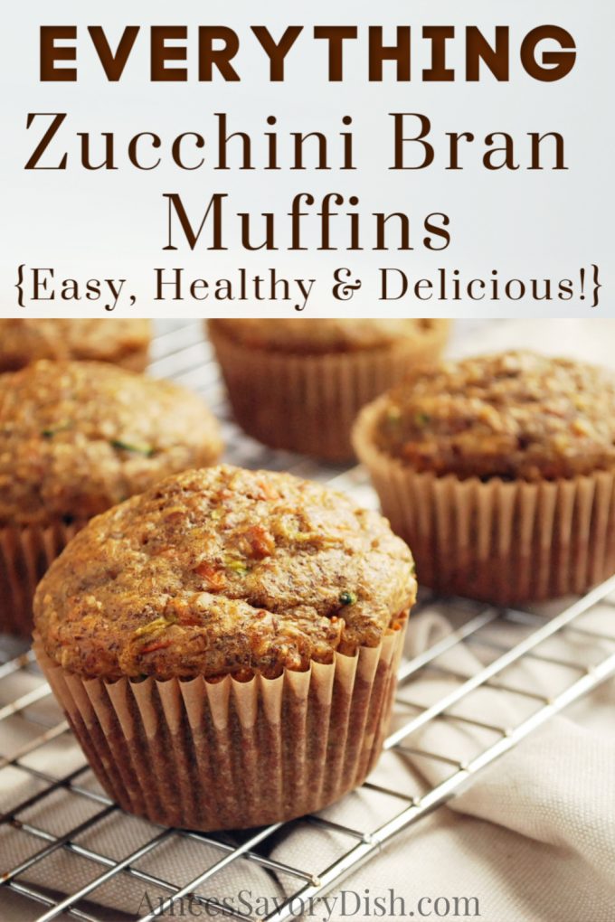 rack of zucchini bran muffins on top of a napkin with font overlay