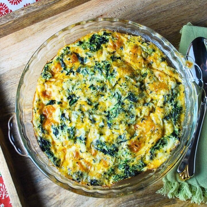 a baked spinach quiche with no crust made with cottage cheese