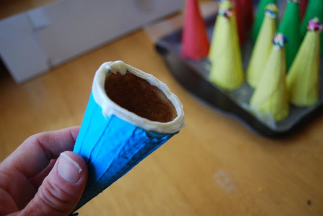 A sugar ice cream cone decorated with blue icing