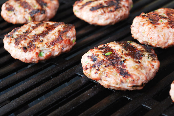 Asian-style pork burgers on the grill