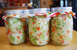 Jars of cucumber relish on a table