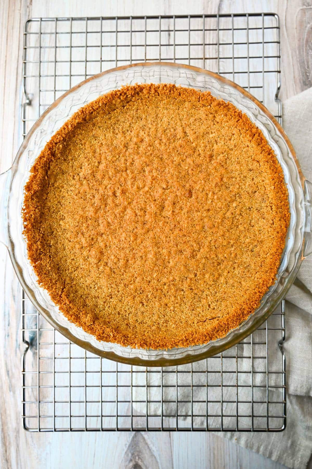 baked pie crust on a cooling rack