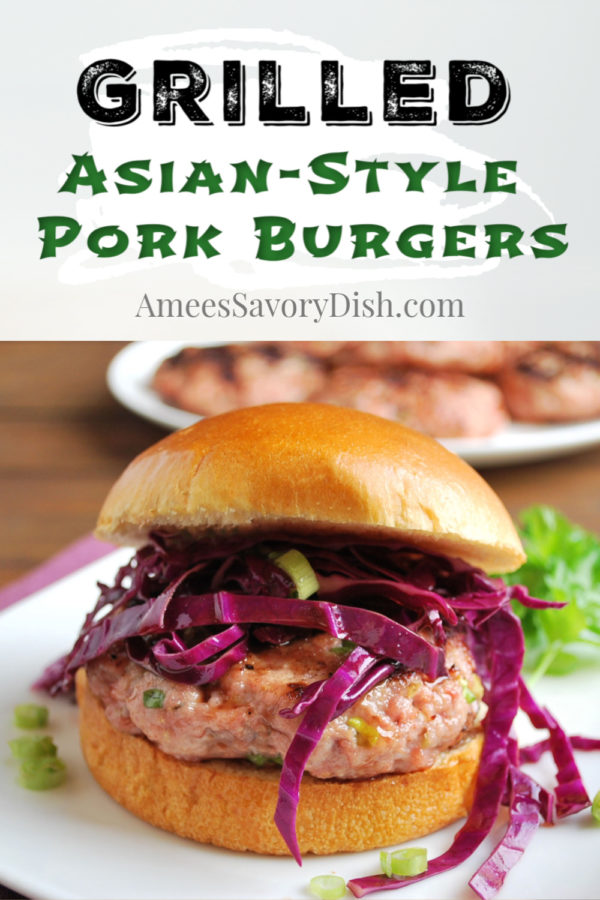 These grilled Asian-style pork burgers are juicy and flavorful made with ground pork, garlic, ginger, sesame oil, green onions, and spices topped with a simple red cabbage slaw. via @Ameessavorydish