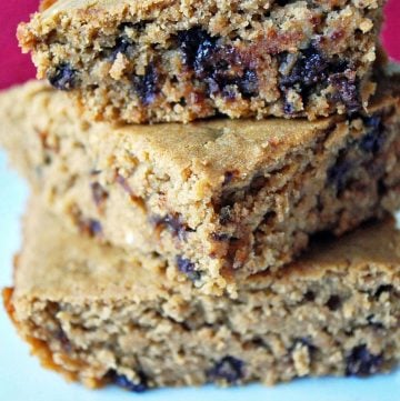 stack of 3 healthier chocolate chip blondies on a plate