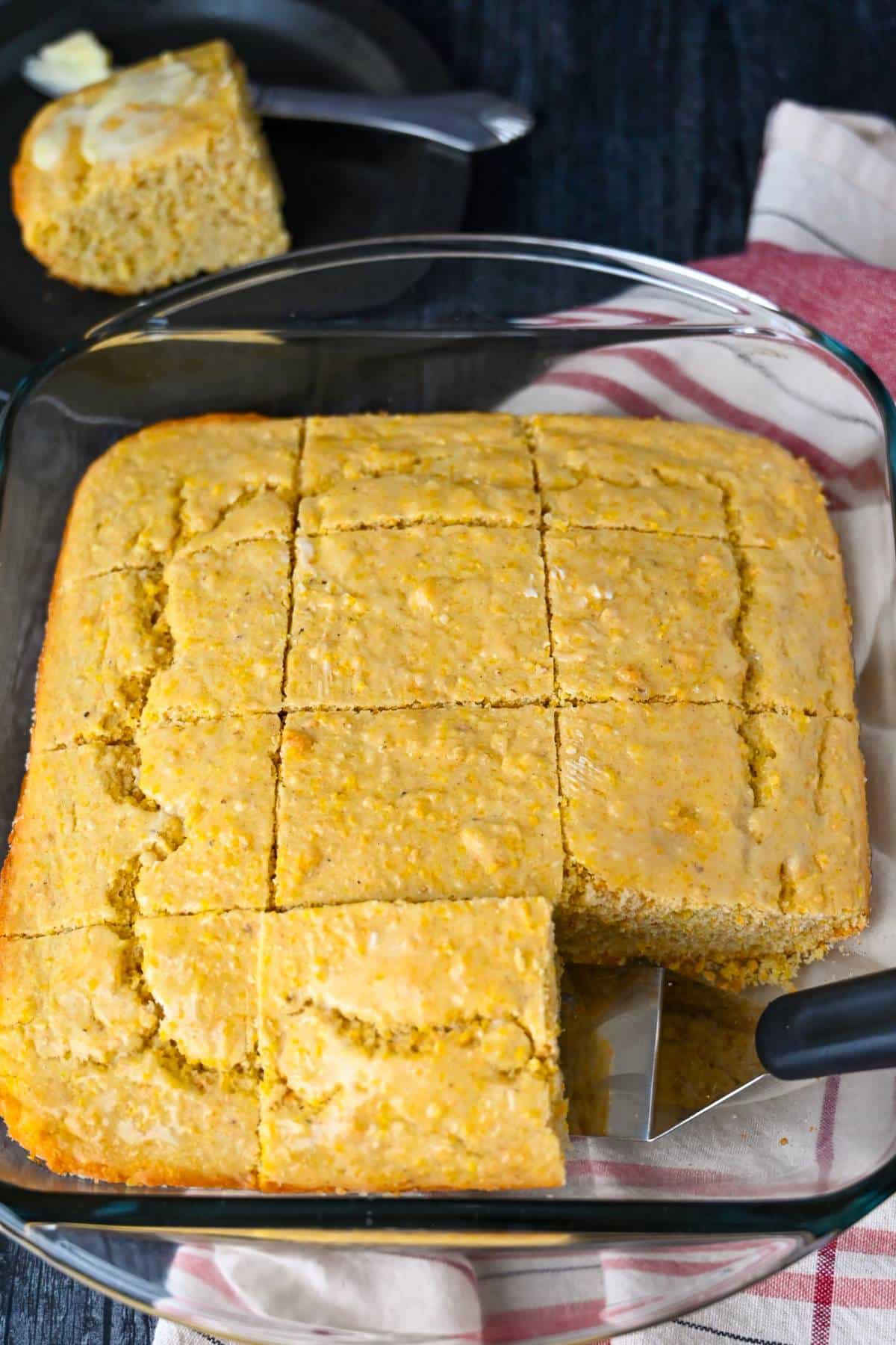 sliced pan of old fashioned gluten free southern cornbread with a slice cut out