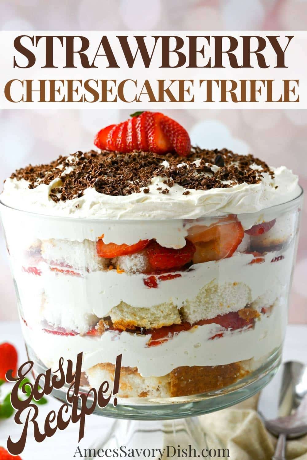 This Strawberry Cheesecake Trifle showcases layered cake, strawberries, and a creamy cheesecake filling. Gluten-free variation included. via @Ameessavorydish