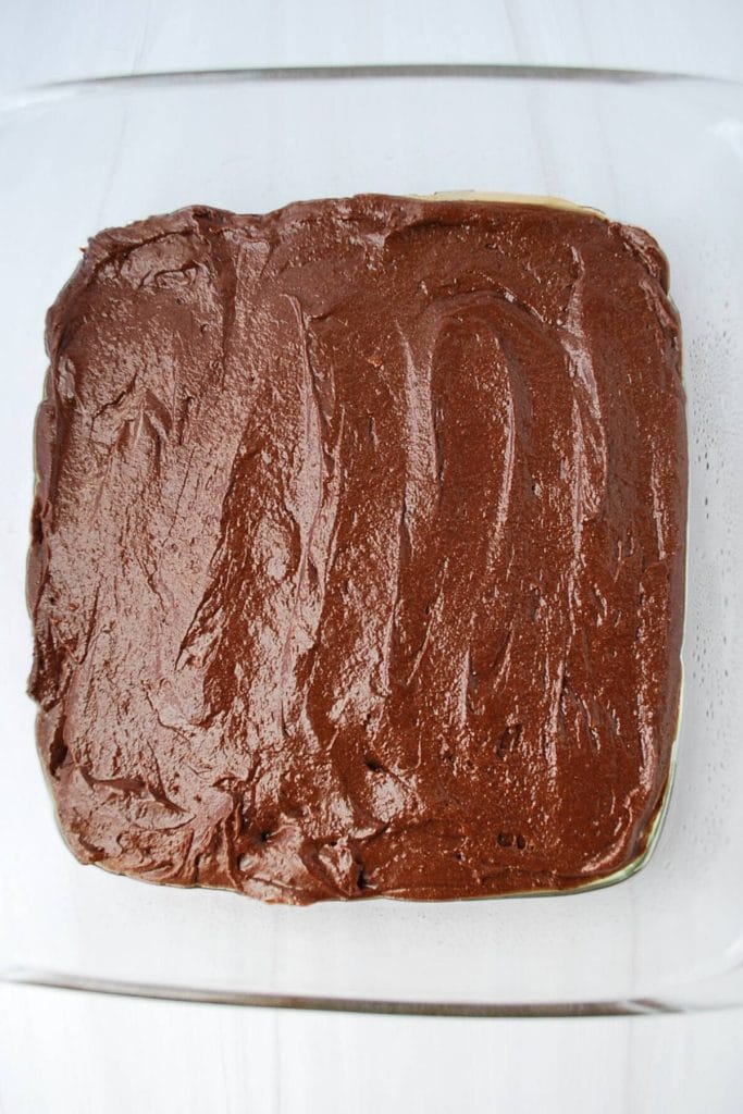 fudgy protein brownie batter spread into baking pan