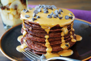 The best chocolate protein pancakes with peanut butter drizzle