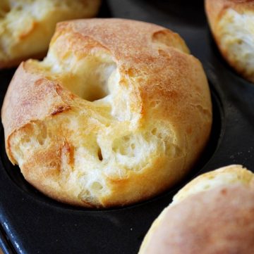 popovers freshly baked in a muffin pan