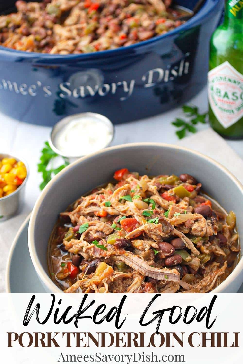 An easy slow cooker recipe for pork tenderloin chili made with black beans, salsa, fresh pork tenderloin, peppers, onions, and spices. This recipe packs 32 grams of protein per serving. via @Ameessavorydish