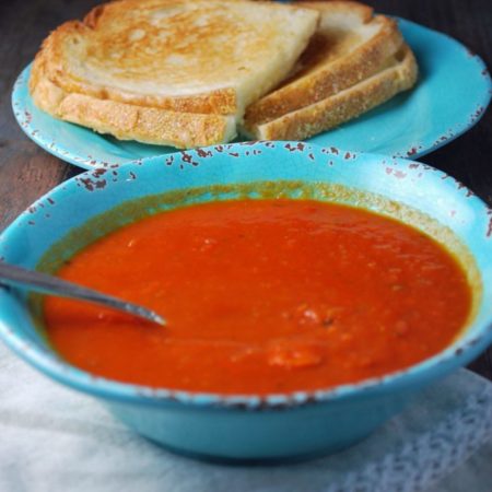 tomato basil bisque and a grilled cheese sandwich
