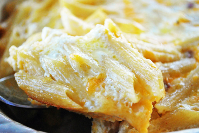 Cheesy Baked Penne Pasta on a spoon