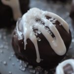 Chocolate Hazelnut Crunch Balls are a rich and delicious cake ball recipe made with creamy Nutella, chopped hazelnuts, chocolate cake and dipped in melted chocolate. These bite-size balls are perfect for a holiday party or cookie exchange.