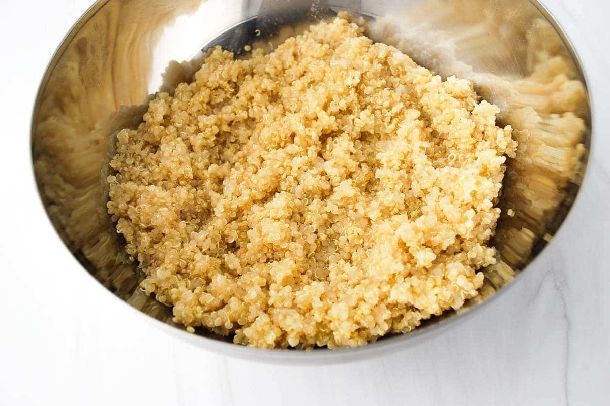quinoa cooling in a metal bowl