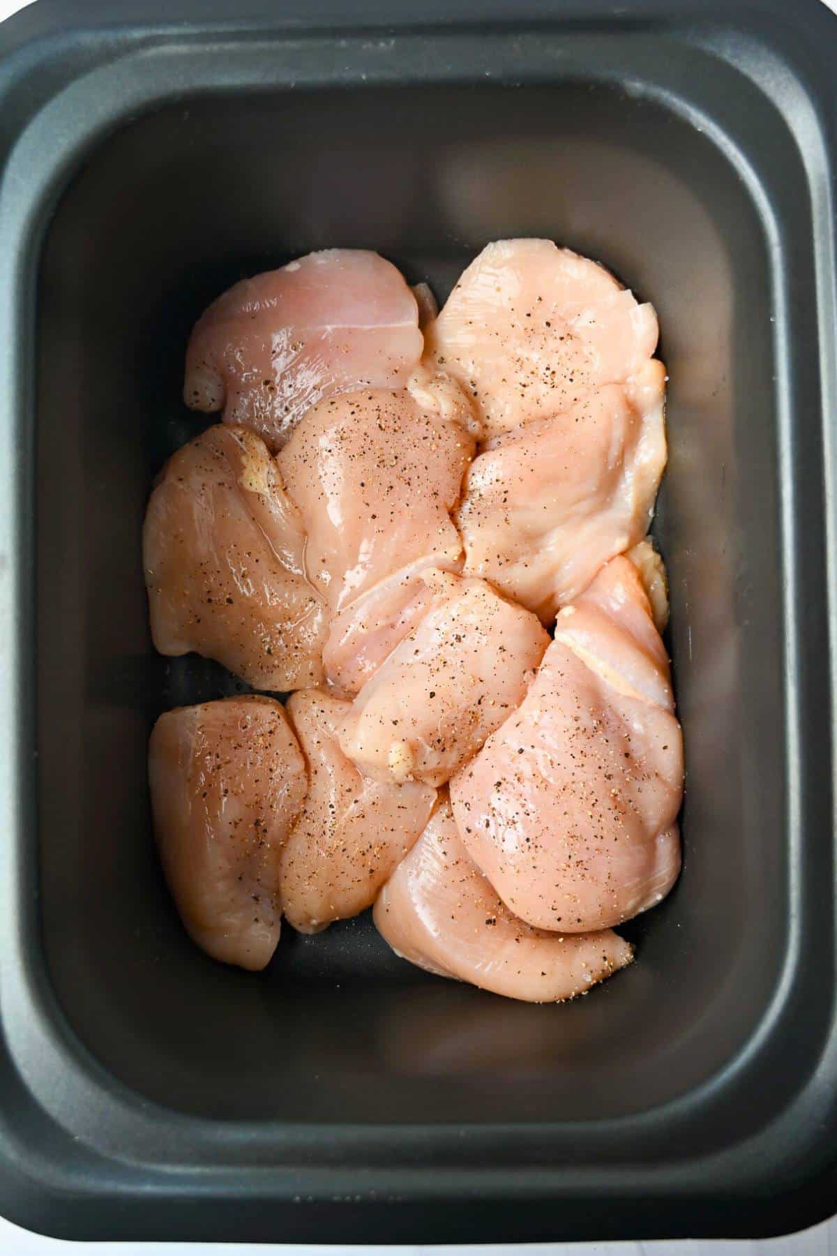 boneless chicken breasts in a slow cooker