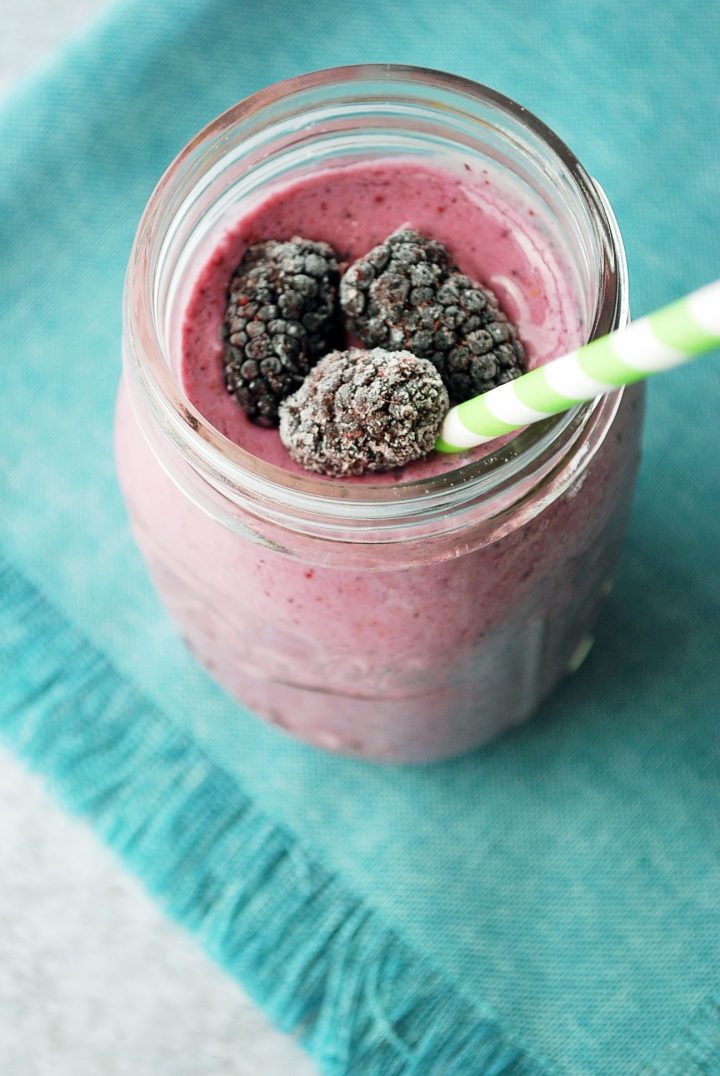 frozen blackberries on top of mixed berry smoothie