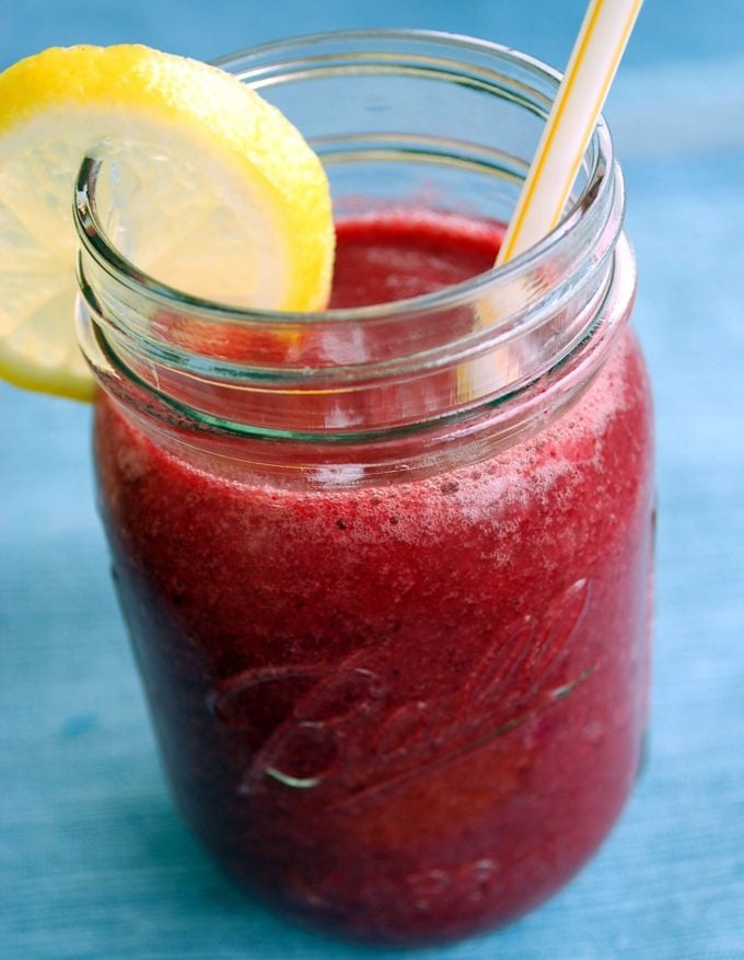 frozen strawberry lemonade in a mason jar