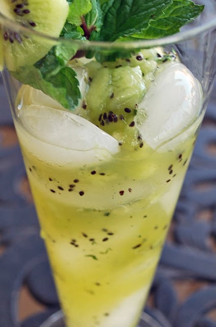 Kiwi mint mojitos give a fruity twist to classic mojito cocktails. This easy cocktail recipe is delicious, and a skinny cocktail recipe, using agave nectar.