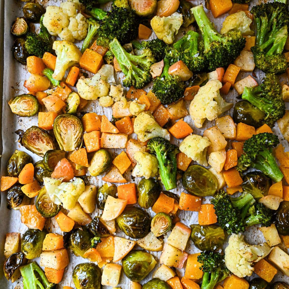 overhead photo of roasted vegetables on a sheet pan