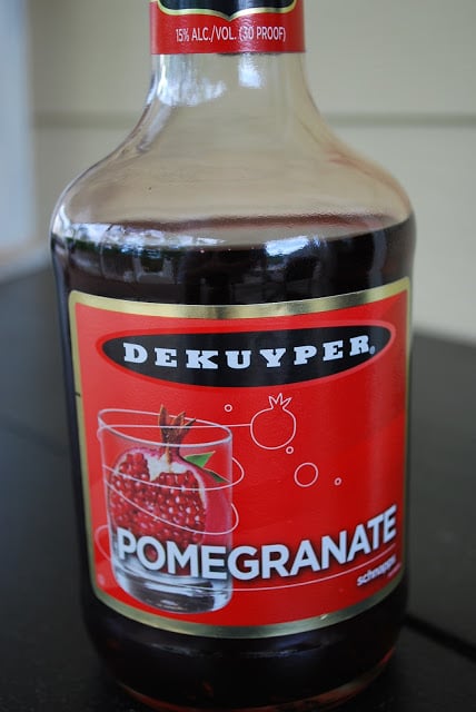A close up of a bottle of Pomegranate liquor