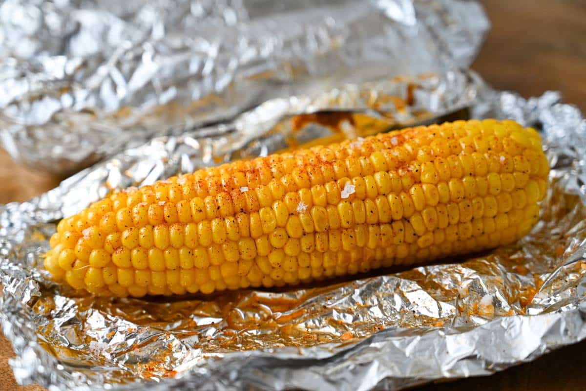 unwrapped ear of griddled corn