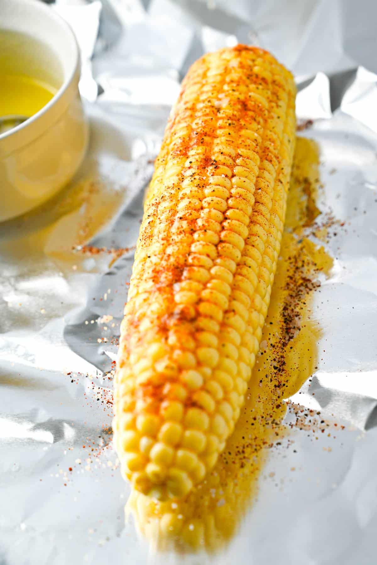 seasoned corn on a piece of foil