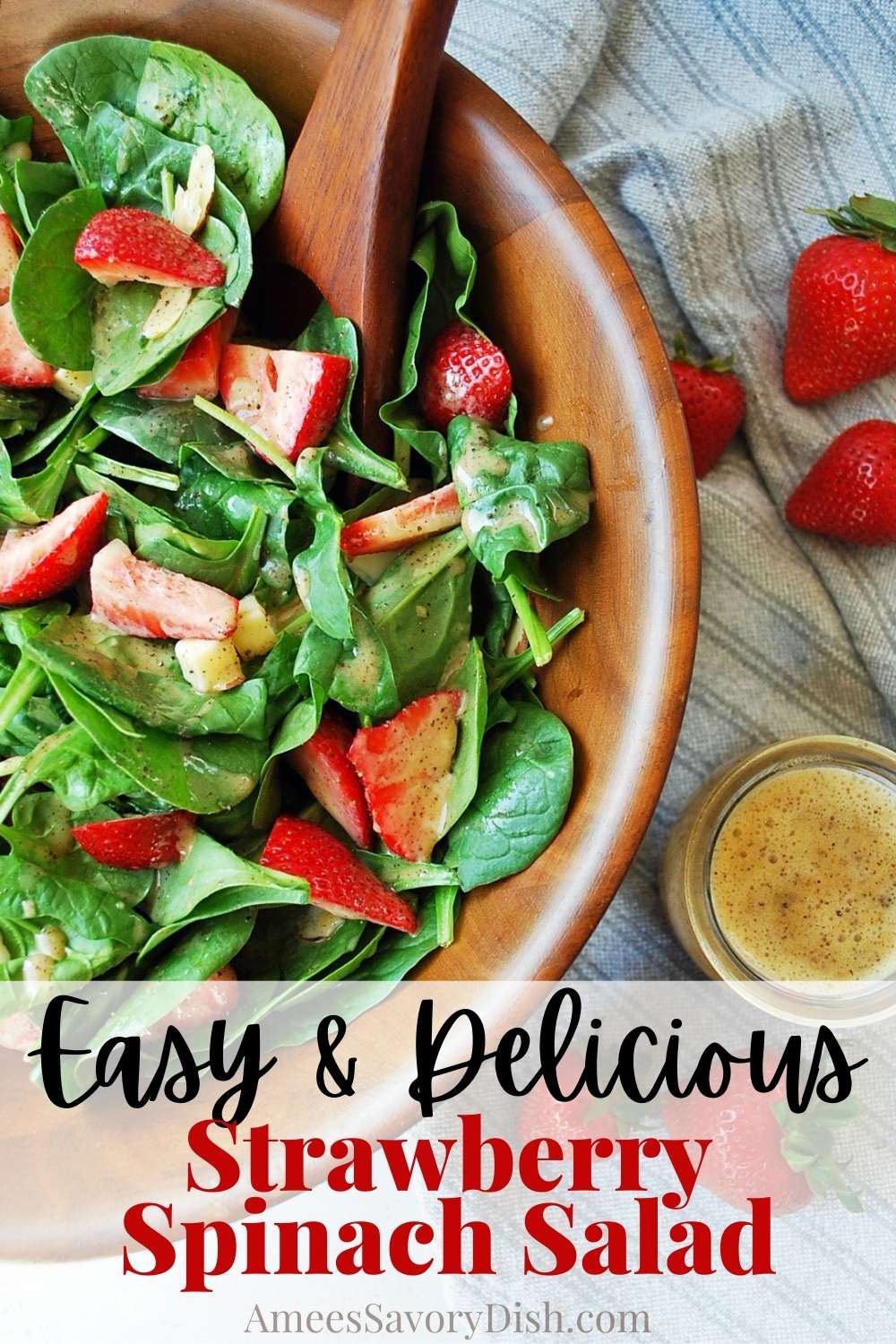 This easy strawberry spinach salad is the perfect summertime side dish made with baby spinach, sliced almonds, fresh berries, and a homemade poppyseed dressing. via @Ameessavorydish