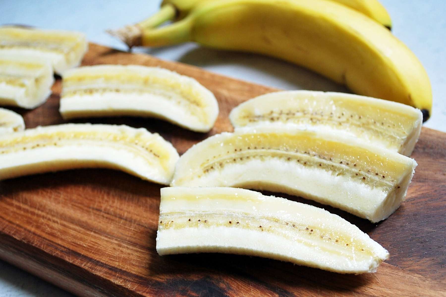 sliced bananas on a cutting board