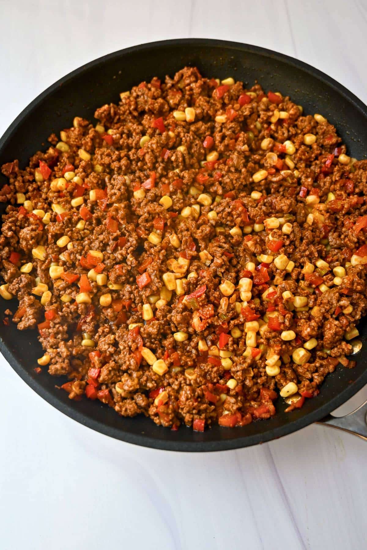 ground beef with corn, peppers, tomato paste and spices