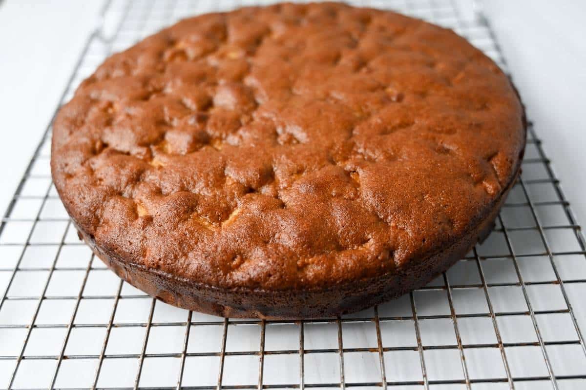 a cooled spice cake on a baking rack