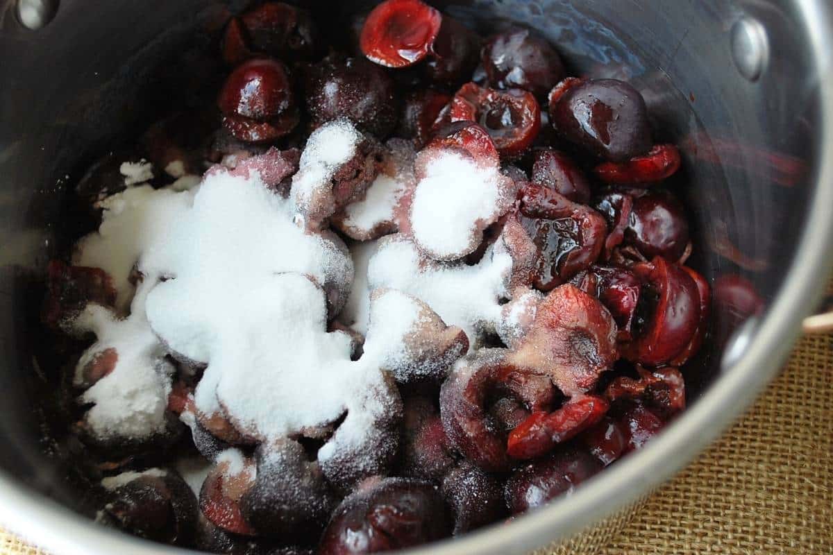 cherry compote ingredients in a saucepan