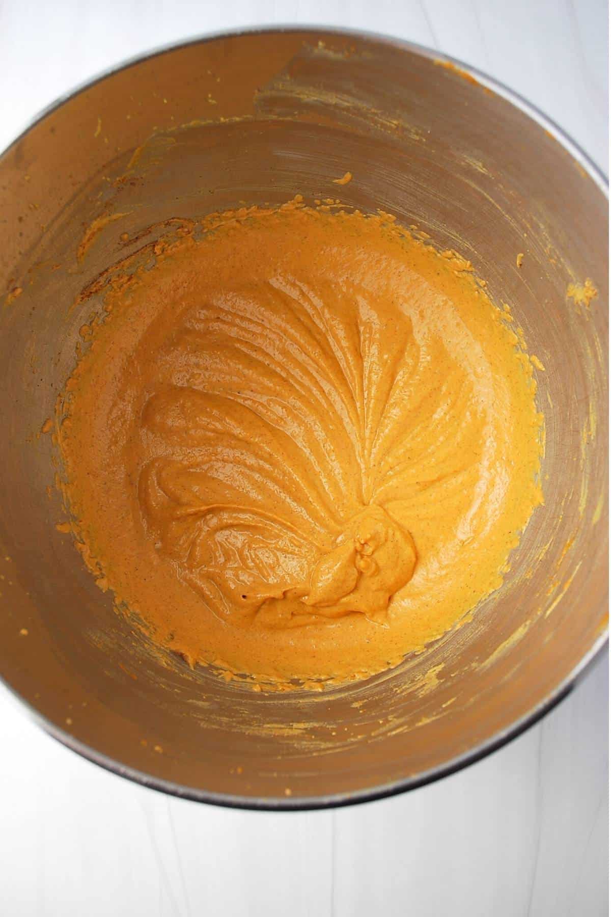 blended pumpkin dip in a mixing bowl