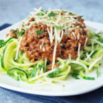 spaghetti with zucchini noodles on a plate