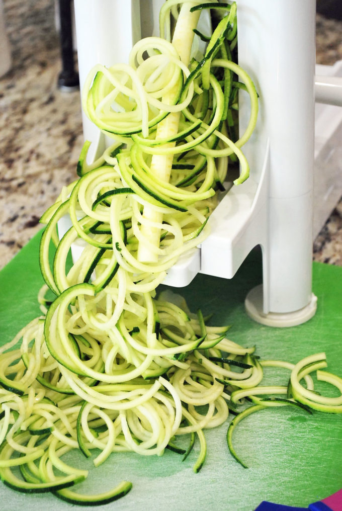 making zucchini noodles with a spiralizer 