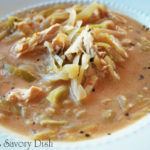 Coconut curry chicken soup is so full of flavor, it will rock your taste buds!! This crockpot recipe makes a spicy soup for a comforting winter time meal.