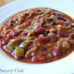Slow cooker vegetarian chili is the perfect weeknight dinner, because it's so incredibly easy to make. The perfect meatless meal recipe for busy days.